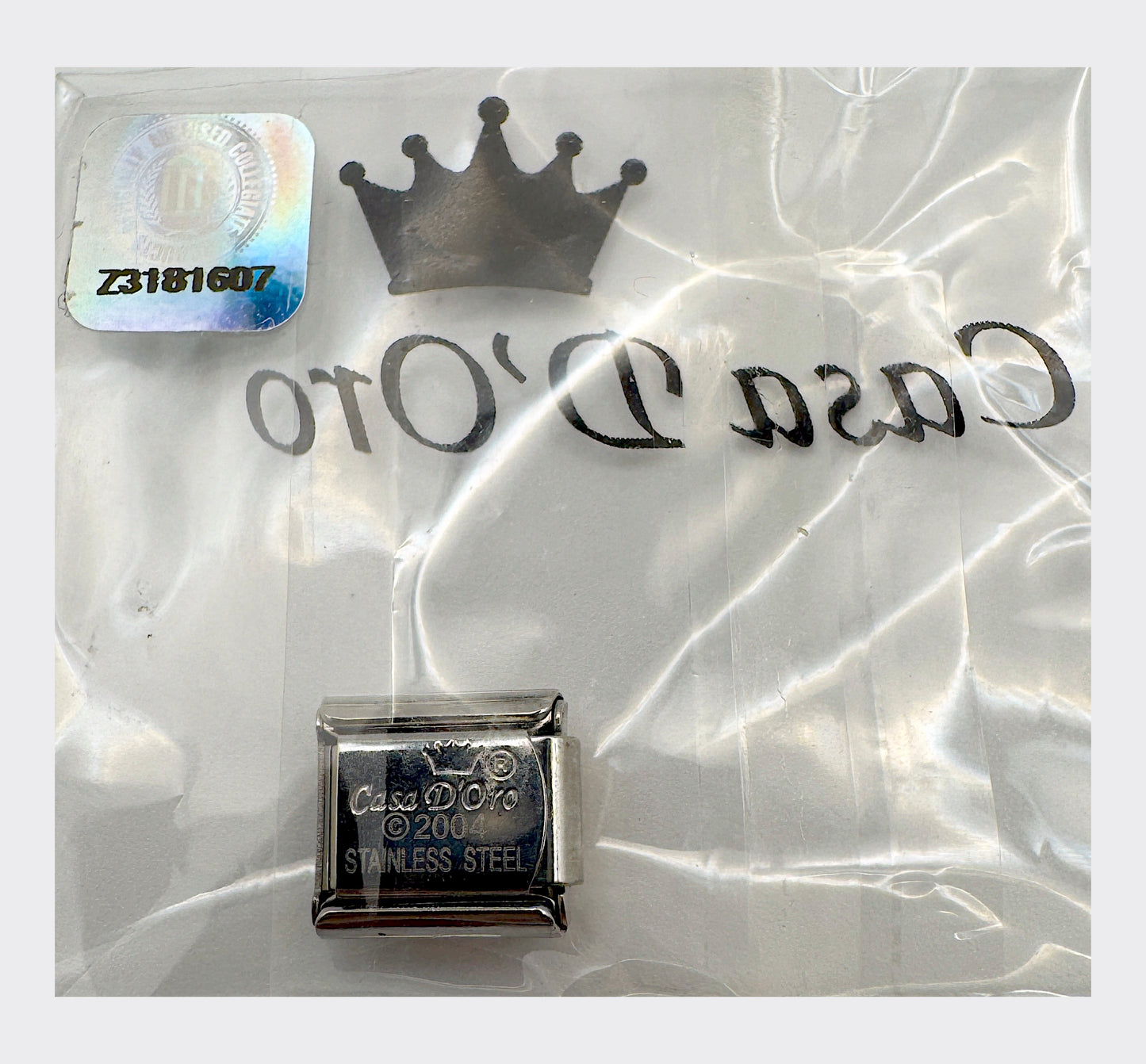 Casa D'Oro 2004 backstamp with numbered Officially Licensed Collegiate Product hologram seal