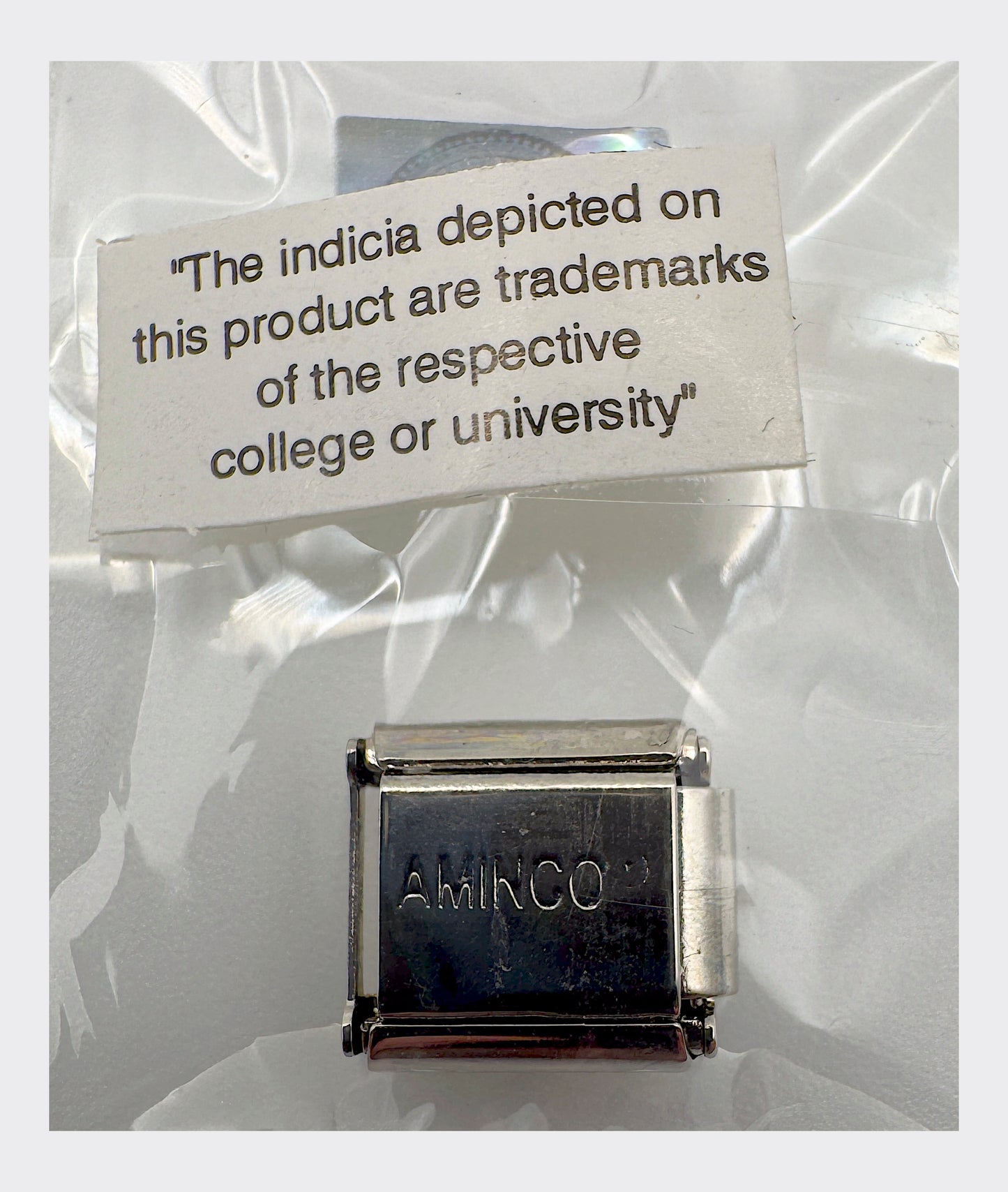 AMINCO maker's mark backstamp with collegiate trademark licensing disclaimer