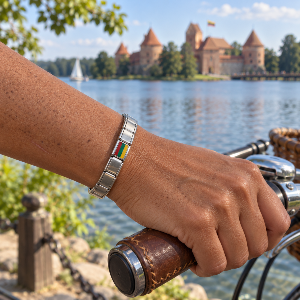 Lithuania flag Italian charm on a shiny silver base bracelet worn while cycling beside Trakai Island Castle