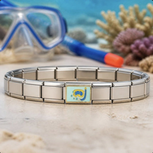 Snorkel Italian charm on bracelet, flat lay