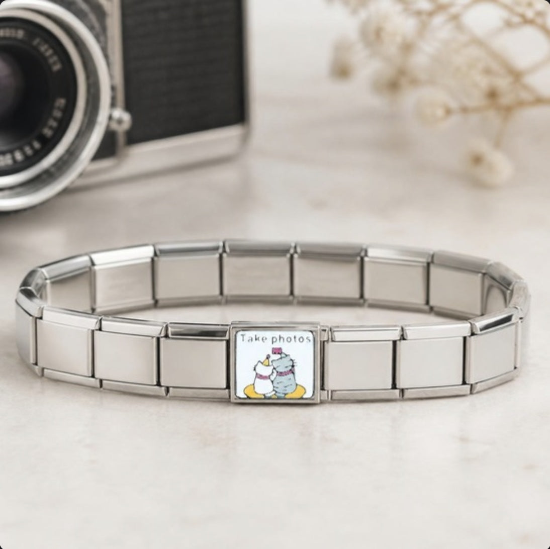 Take Photos Italian charm on bracelet, flat lay