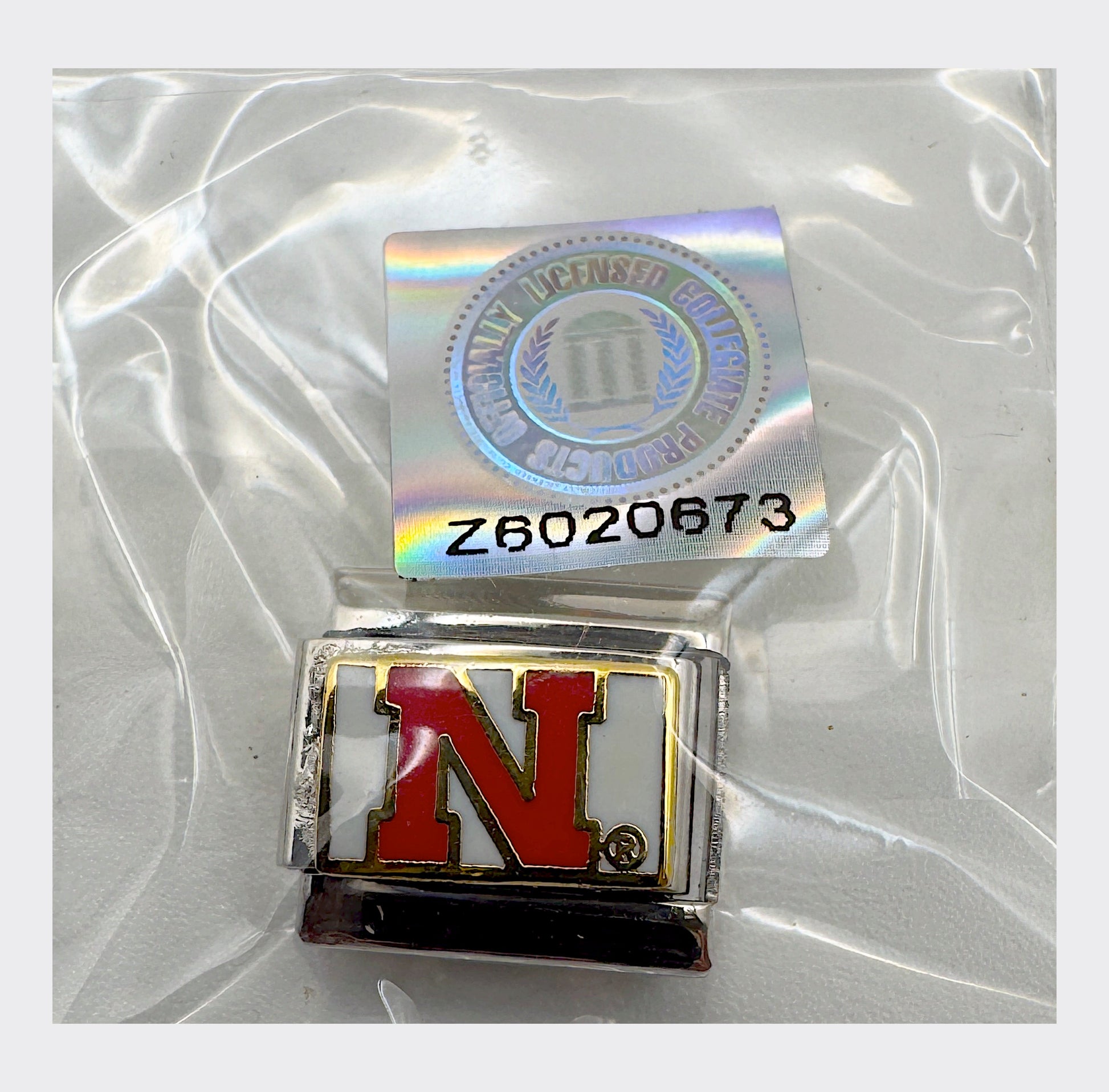 Vintage NCAA Nebraska Huskers Italian charm, sealed in original packaging
