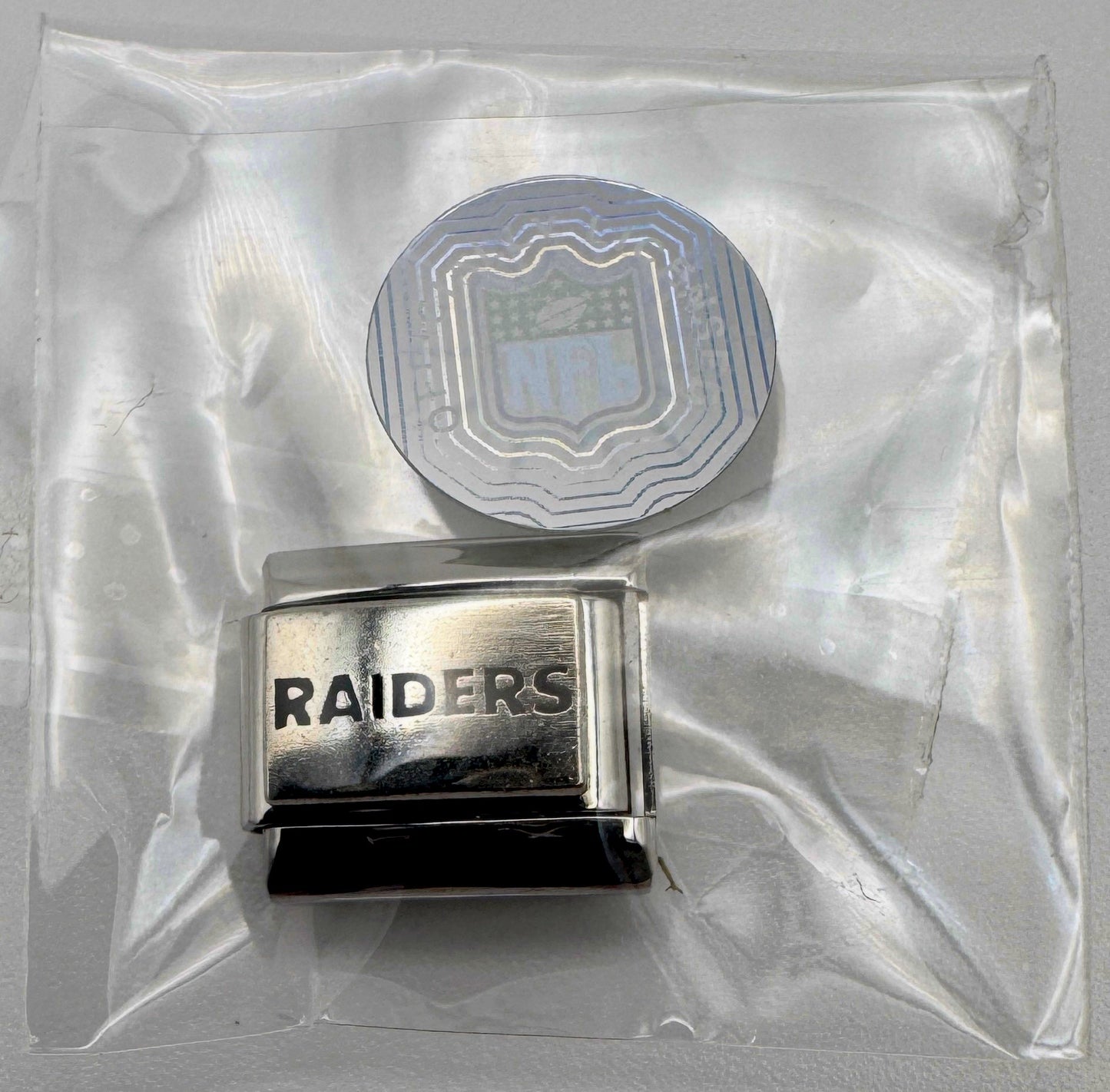 Vintage NFL Las Vegas Raiders Italian charm, sealed in original packaging with NFL hologram seal