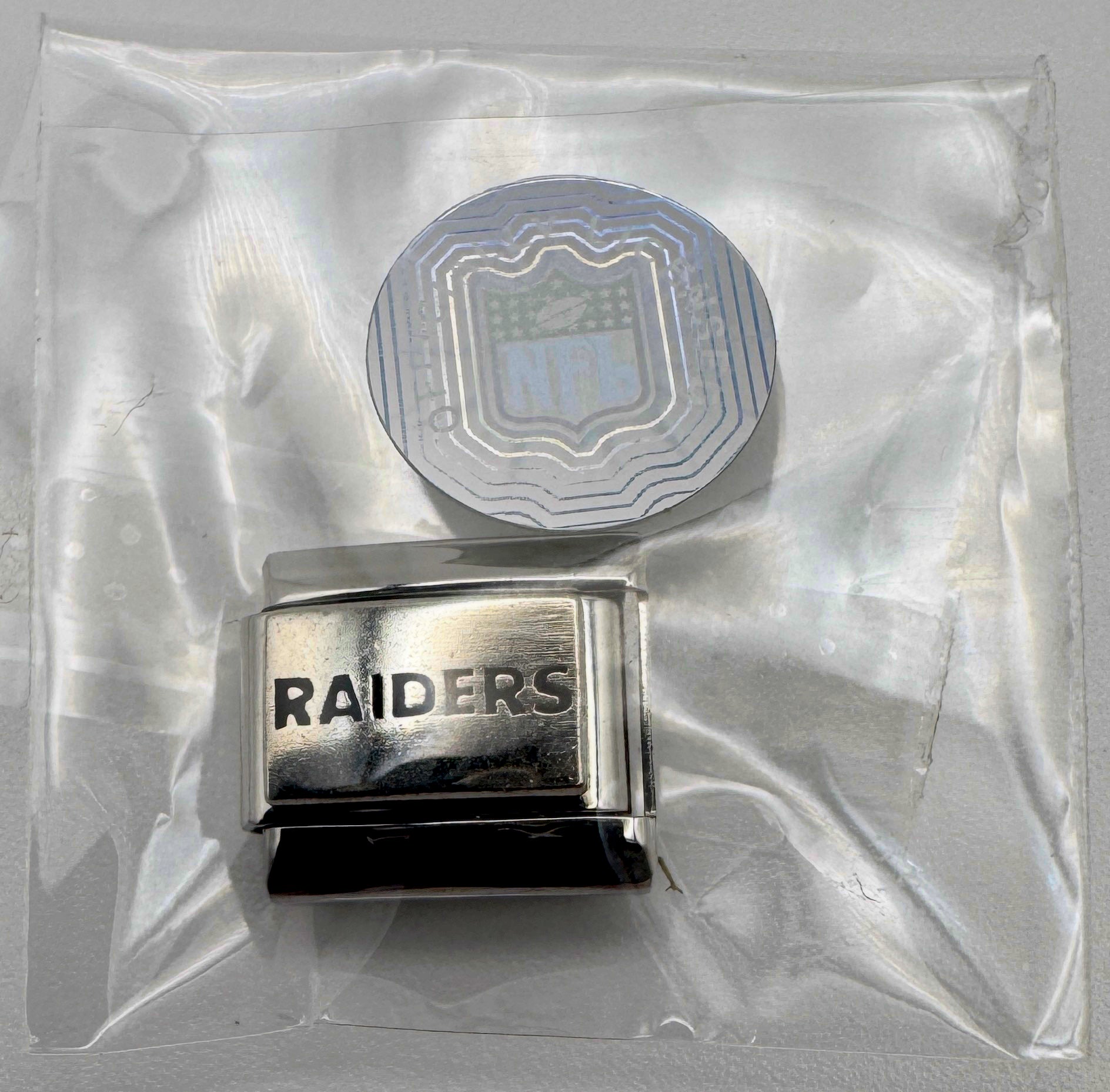 Vintage NFL Las Vegas Raiders Italian charm, sealed in original packaging with NFL hologram seal