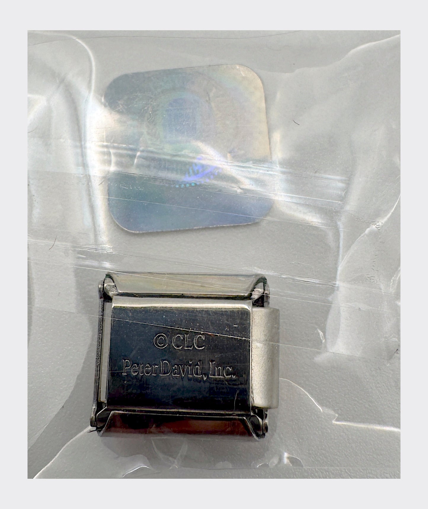 CLC / Peter David, Inc. backstamp with Collegiate Licensed Product hologram seal