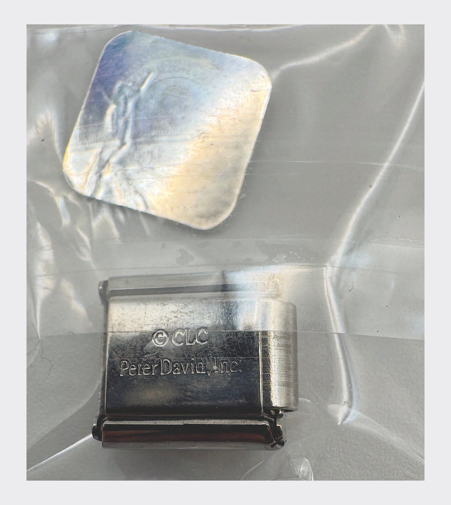 CLC / Peter David, Inc. backstamp with Collegiate Licensed Product hologram seal