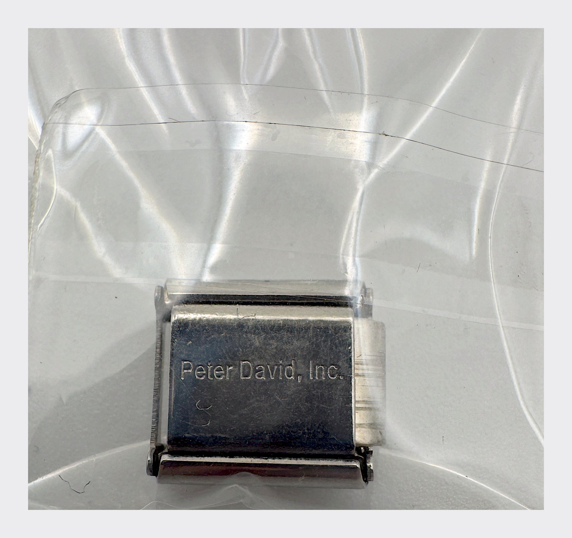 CLC / Peter David, Inc. backstamp with Collegiate Licensed Product hologram seal