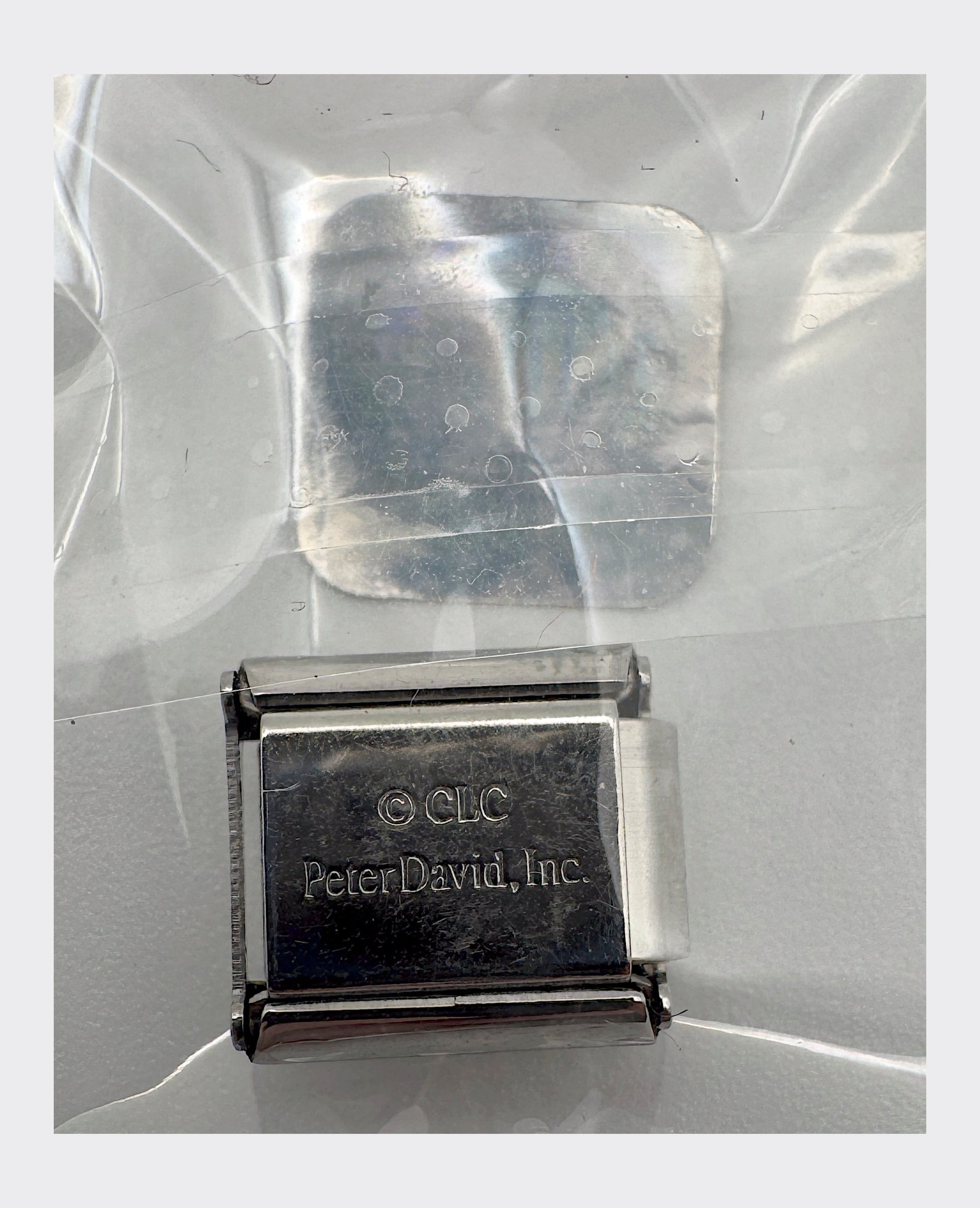 CLC / Peter David, Inc. backstamp with Collegiate Licensed Product hologram seal
