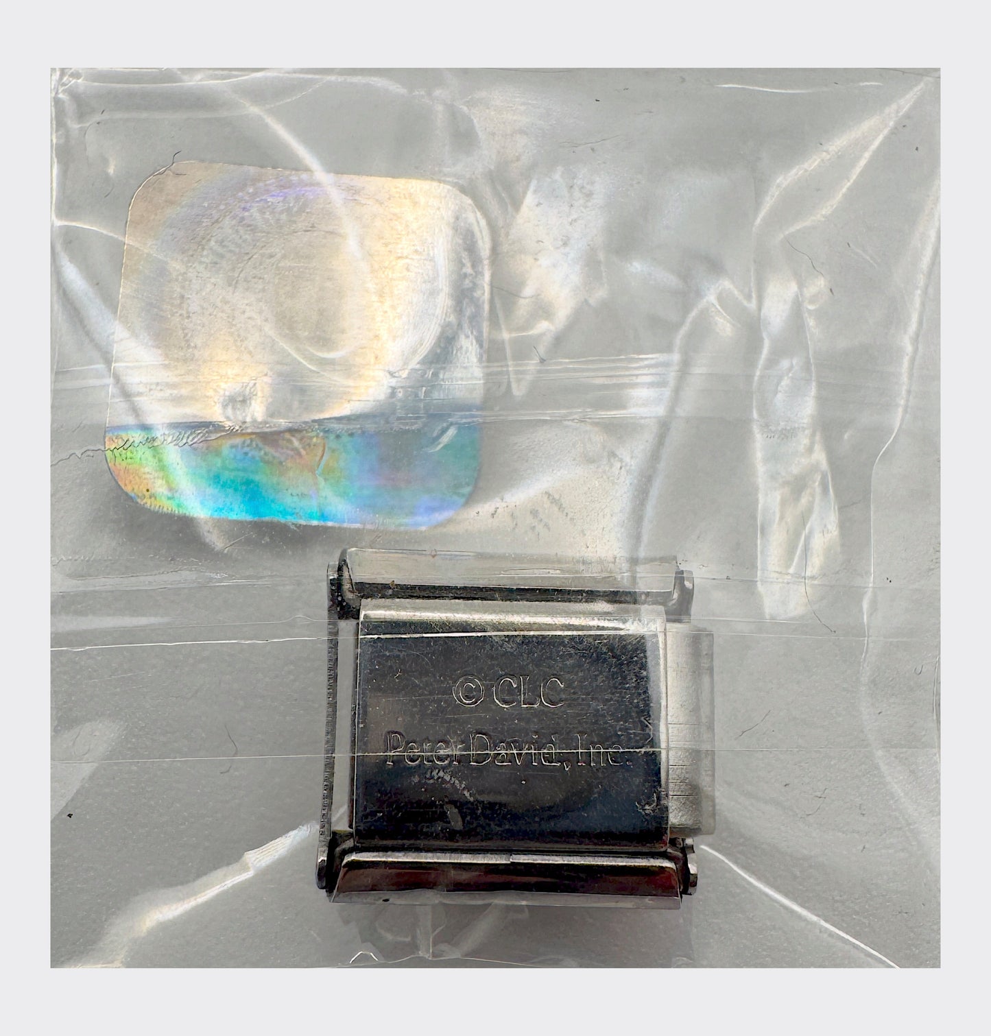 CLC / Peter David, Inc. backstamp with Collegiate Licensed Product hologram seal