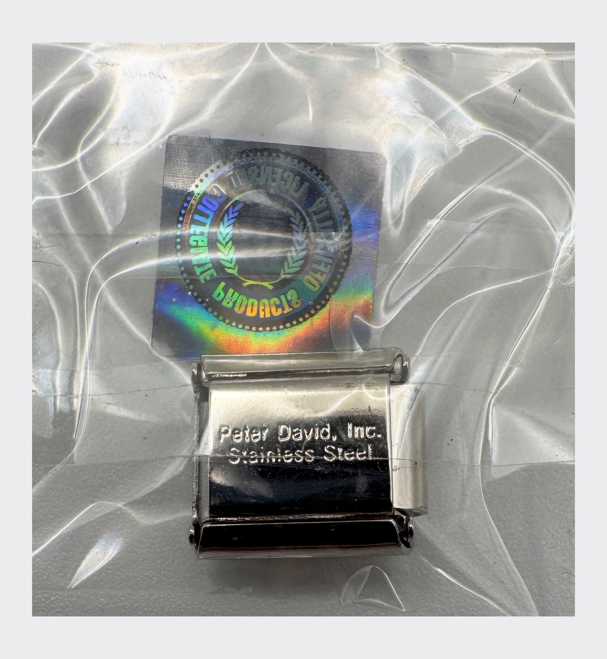 CLC / Peter David, Inc. backstamp with Collegiate Licensed Product hologram seal