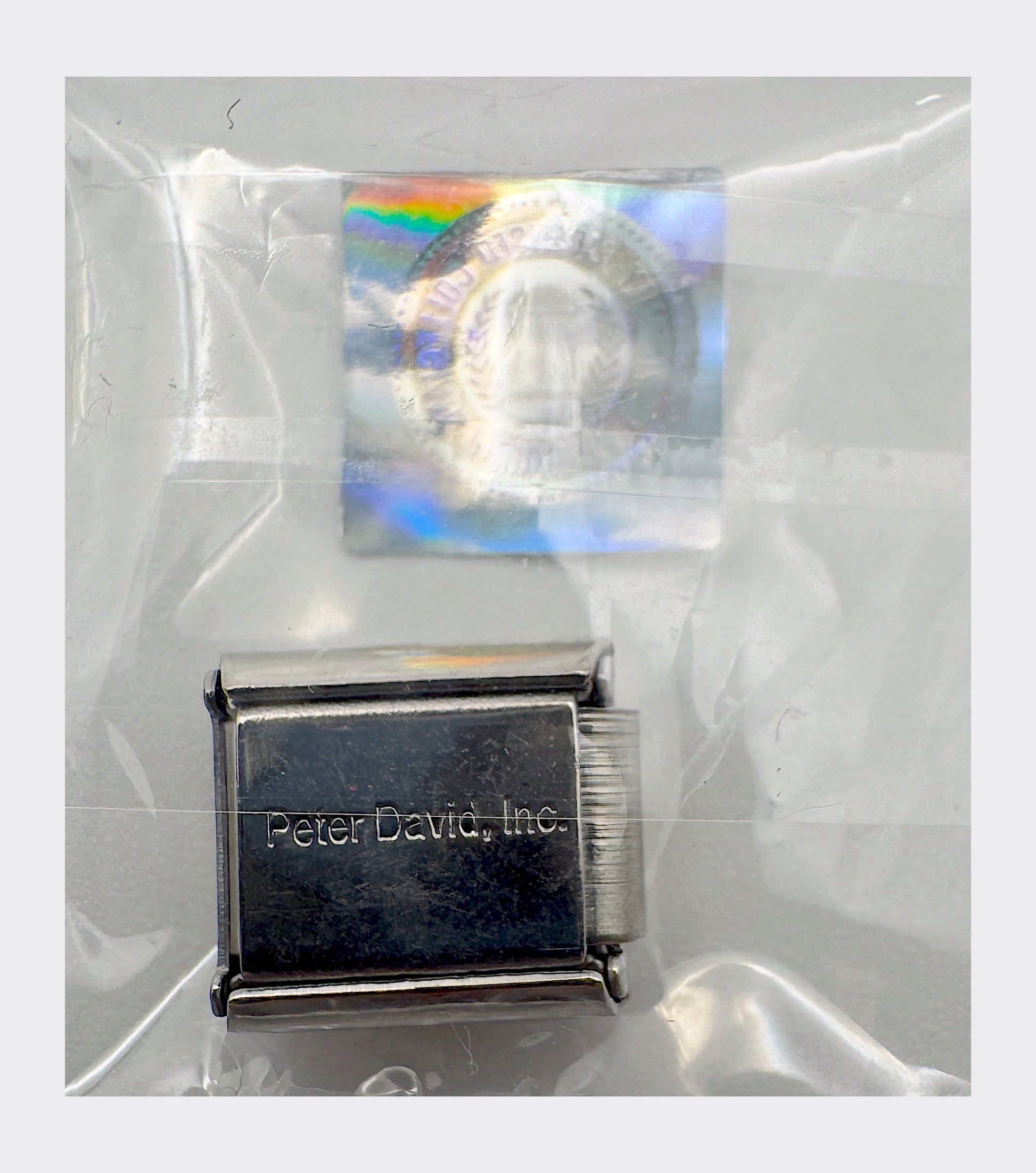 CLC / Peter David, Inc. backstamp with Collegiate Licensed Product hologram seal