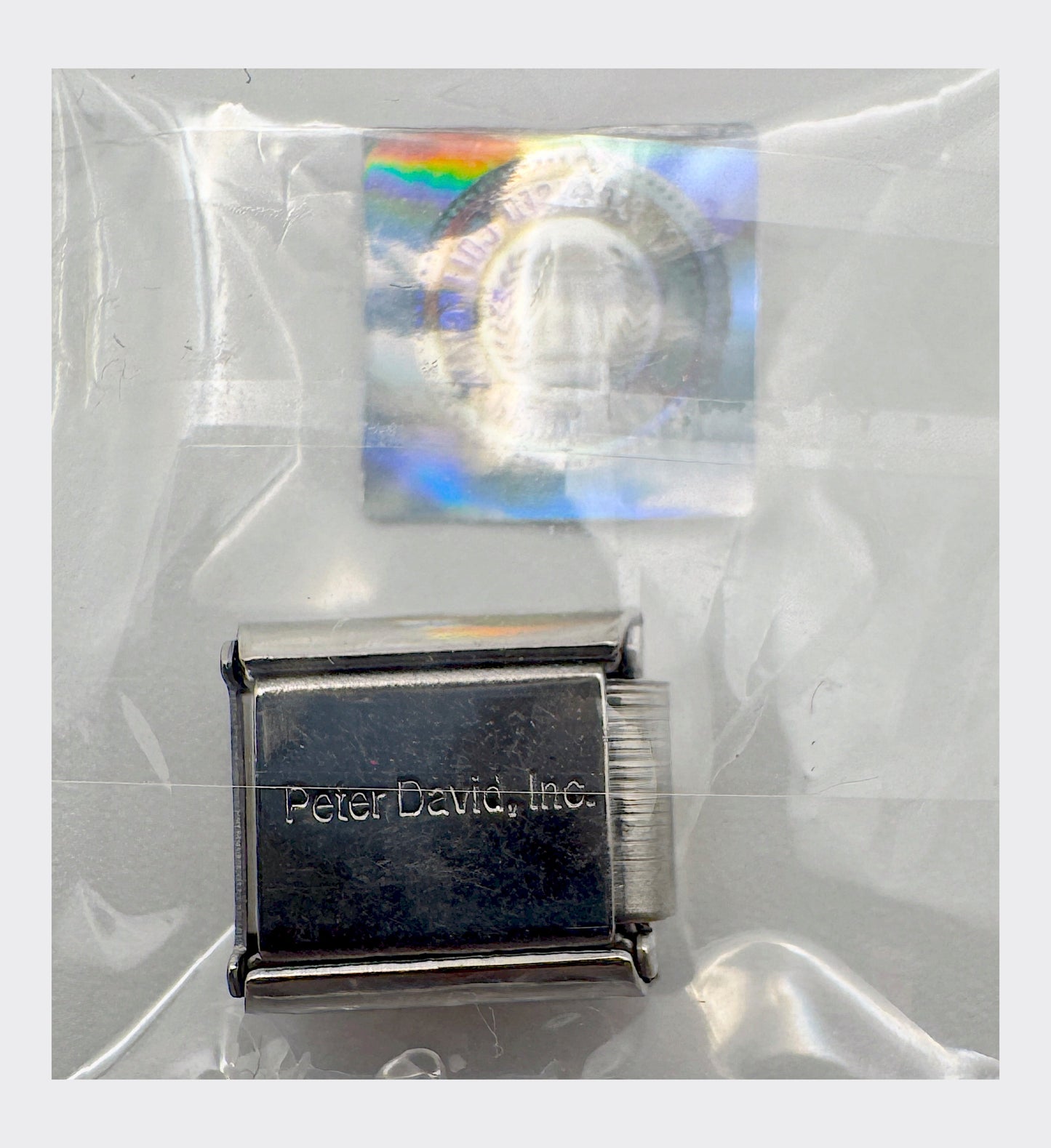 CLC / Peter David, Inc. backstamp with Collegiate Licensed Product hologram seal