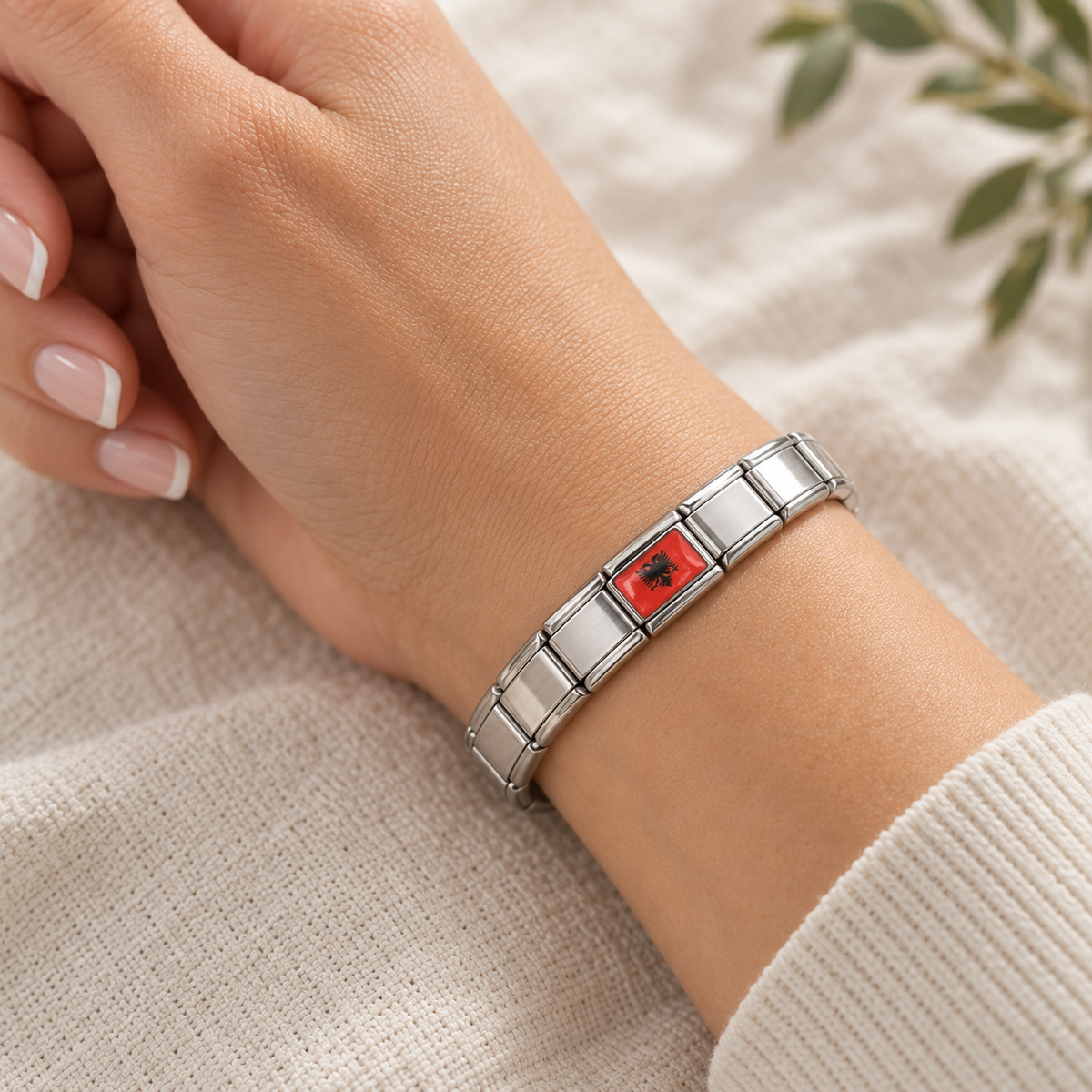 Albania flag Italian charm shown on a polished silver Italian charm bracelet
