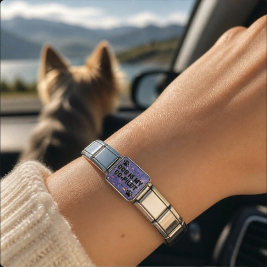 Dog Is My Co-Pilot Italian Charm on a bracelet, worn on wrist