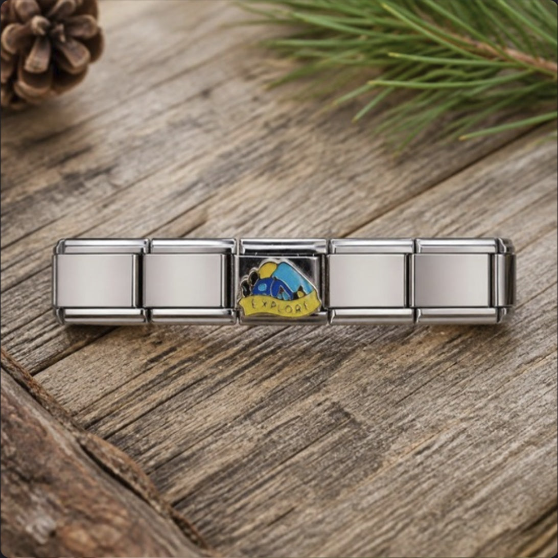 Explore Camping Italian Charm on a bracelet, flat lay