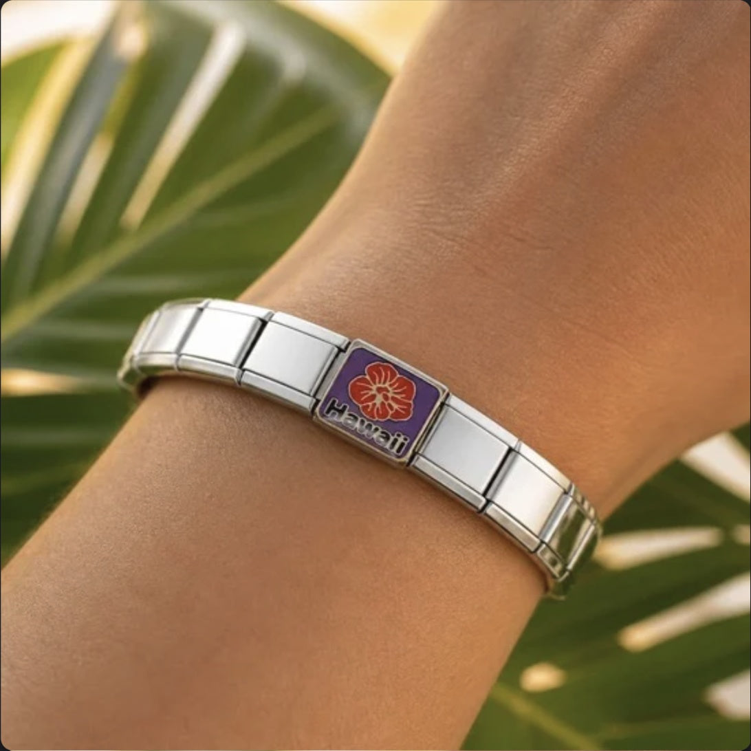 Hawaii Hibiscus Italian Charm on a bracelet, worn on wrist