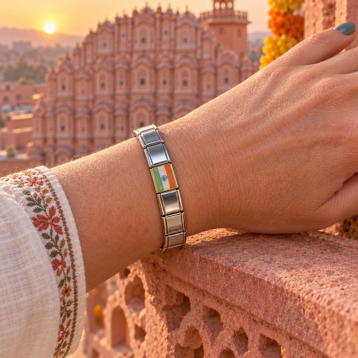 Y2K Vintage India flag Italian charm on a polished silver Italian charm bracelet worn at Jaipur’s Hawa Mahal at sunrise
