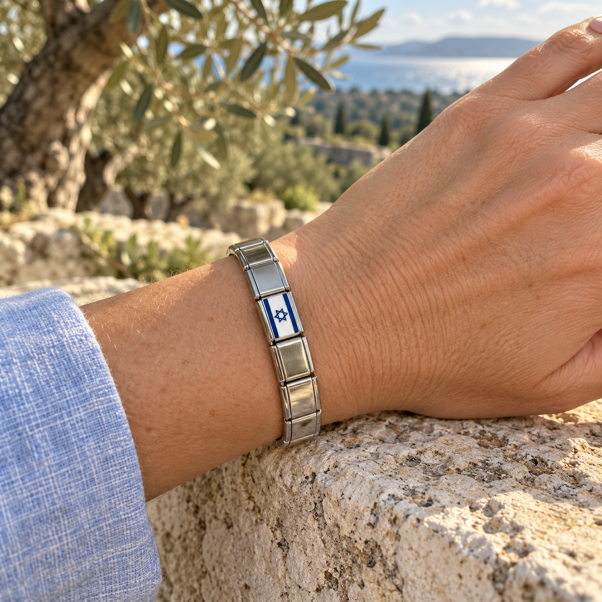 Israel flag Italian charm on a shiny silver base Italian bracelet worn in a Mediterranean olive grove