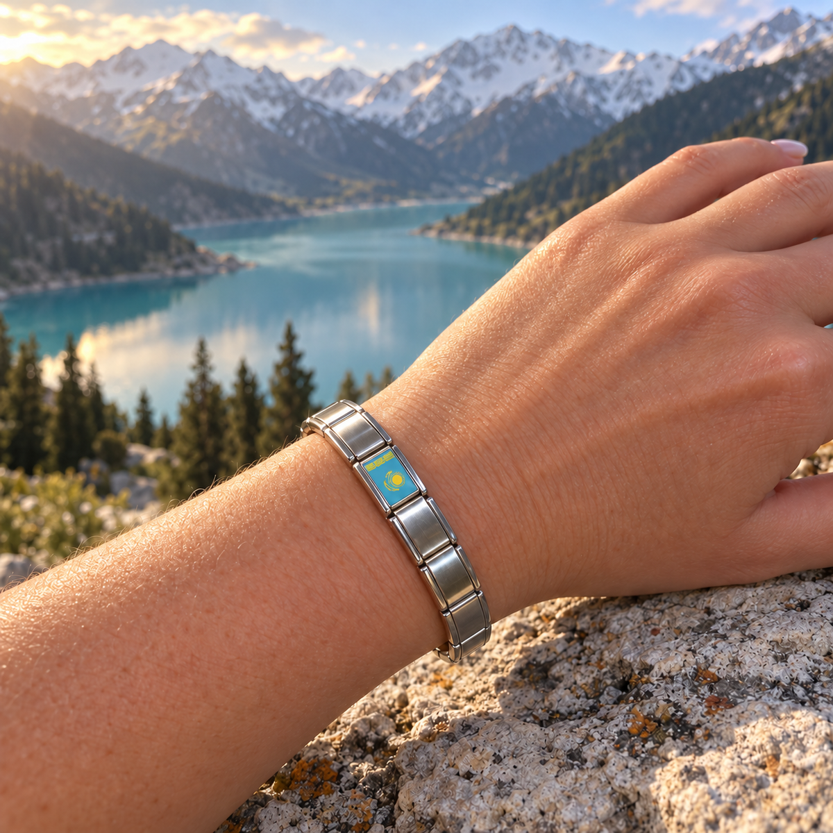 Kazakhstan flag Italian charm on a polished silver modular bracelet overlooking a turquoise alpine lake and the Tian Shan mountains