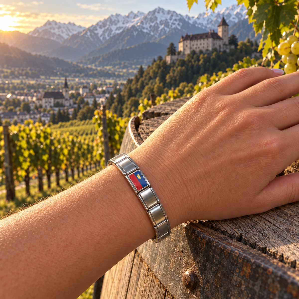 Liechtenstein flag Italian charm on a silver 9mm modular bracelet at a vineyard overlooking Vaduz Castle and the Alps